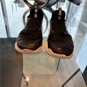 Nike Black and White Slip-On Athletic Sneakers